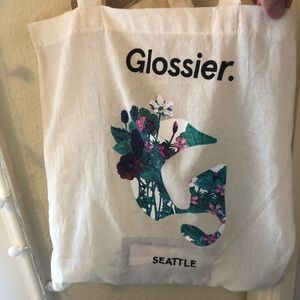 Glossier bag with goodies